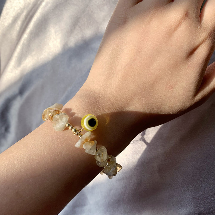 Pulsera con colgante de ojo malvado de grava de cristal natural de Olivenorma