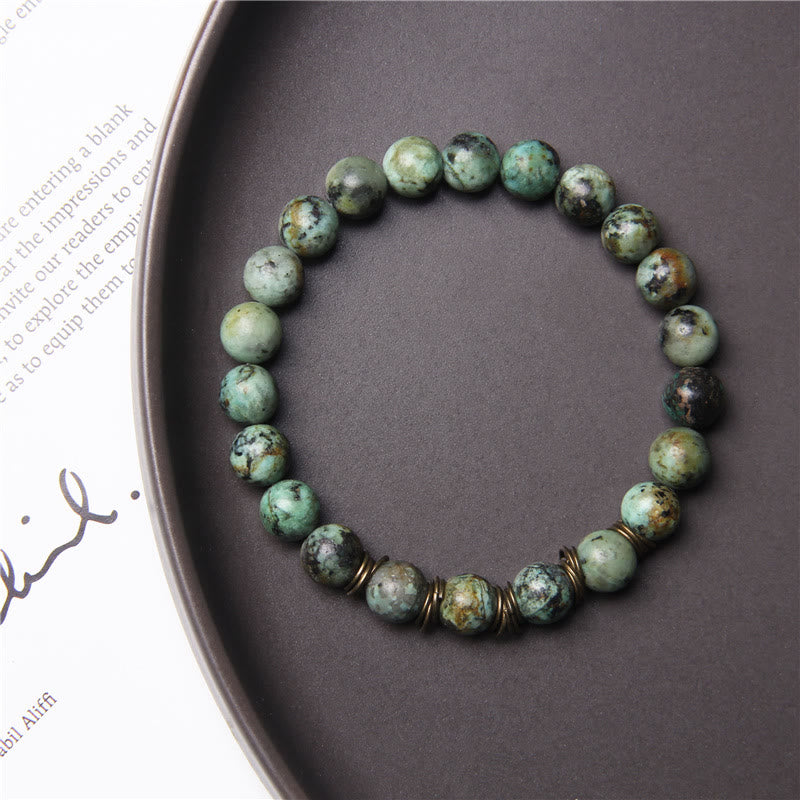 Pulsera elástica de yoga con cuentas de piedra natural pulida de 8 mm de Olivenorma
