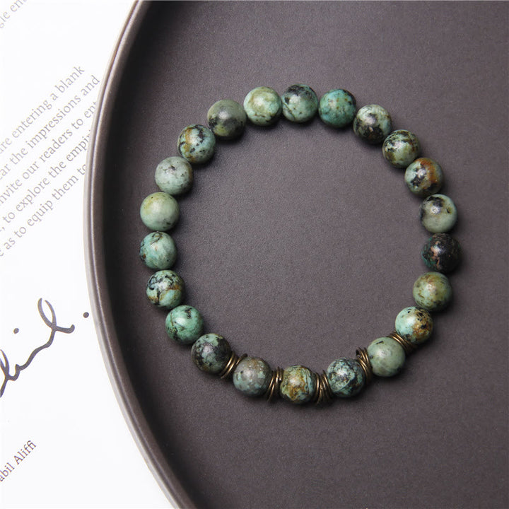 Pulsera elástica de yoga con cuentas de piedra natural pulida de 8 mm de Olivenorma