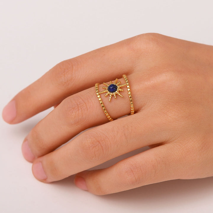 Anillo de gemas con estrella de ocho puntas y doble hilera de girasol de Olivenorma