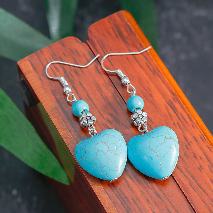 Pendientes colgantes con forma de corazón de turquesa de Olivenorma