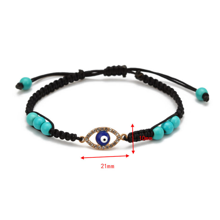 Pulsera trenzada ajustable con ojo malvado y circonita blanca y turquesa de Olivenorma 