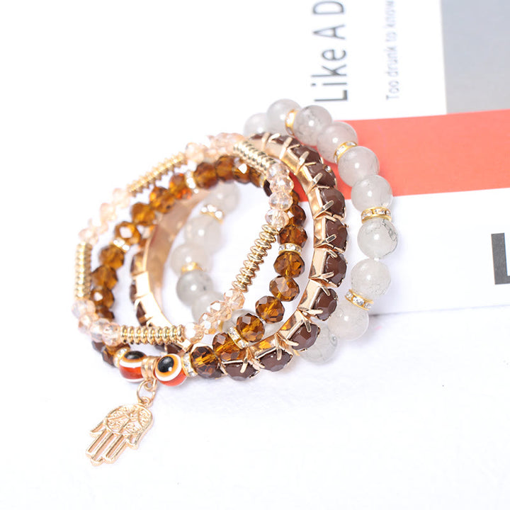 Juego de pulseras de cuentas de cuatro capas con ojo turco y hamsa de Olivenorma 