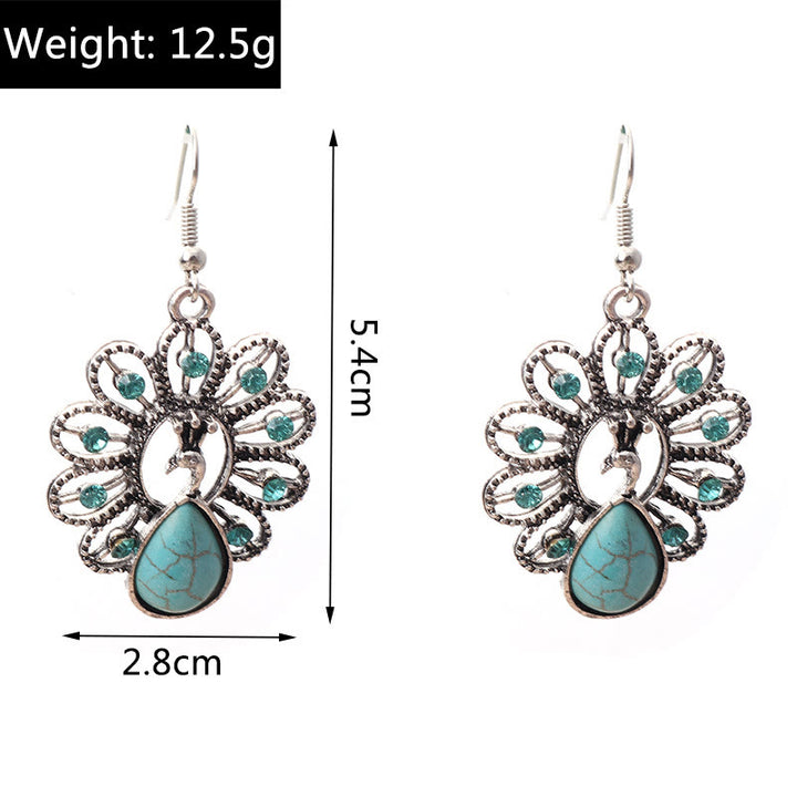 Pendientes colgantes en forma de pavo real con turmalina Paraiba y turquesa de Olivenorma