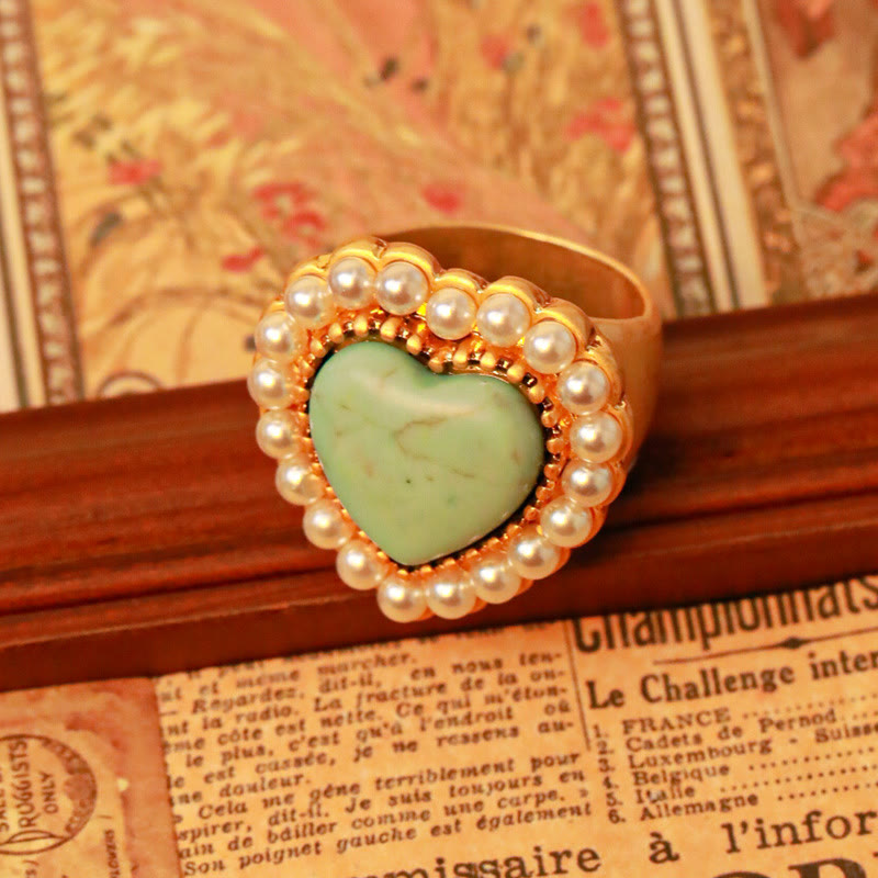 Anillo ajustable en forma de corazón con perla turquesa de Olivenorma 