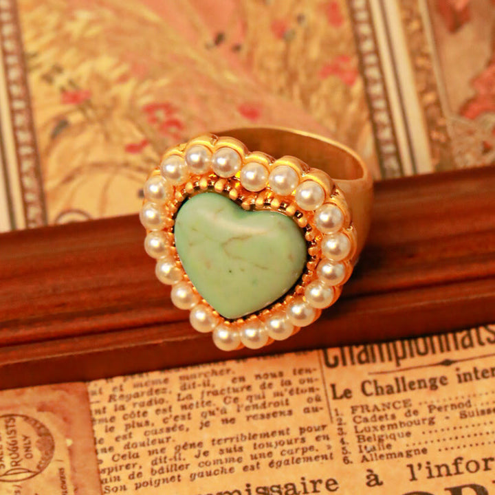 Anillo ajustable en forma de corazón con perla turquesa de Olivenorma 