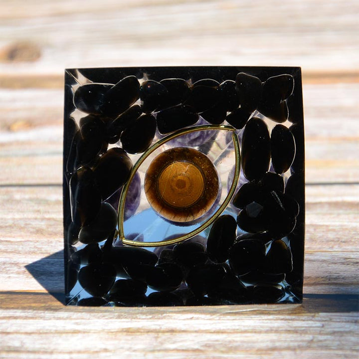 Esfera de amatista de Olivenorma con pirámide de orgón de obsidiana y ojo de tigre