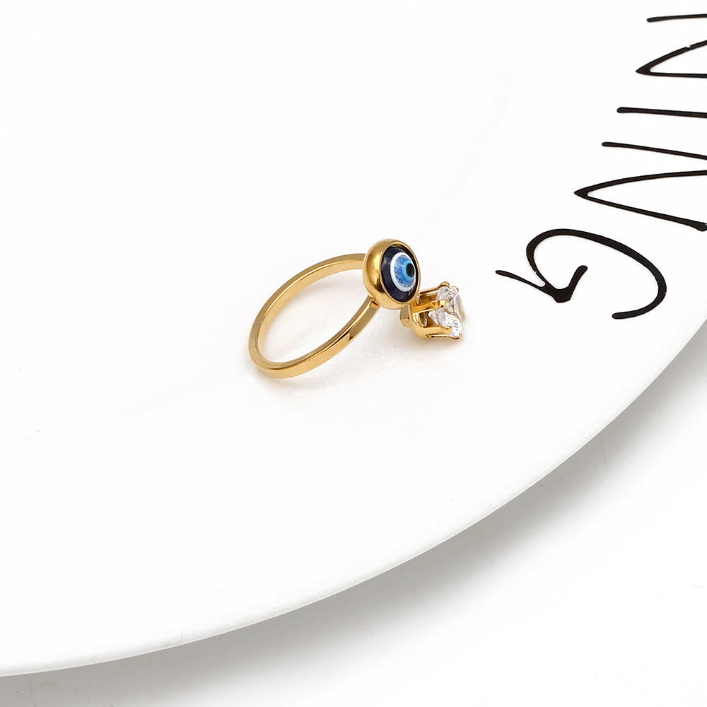 Anillo de mujer con ojo malvado bañado en oro y circonita blanca de Olivenorma 