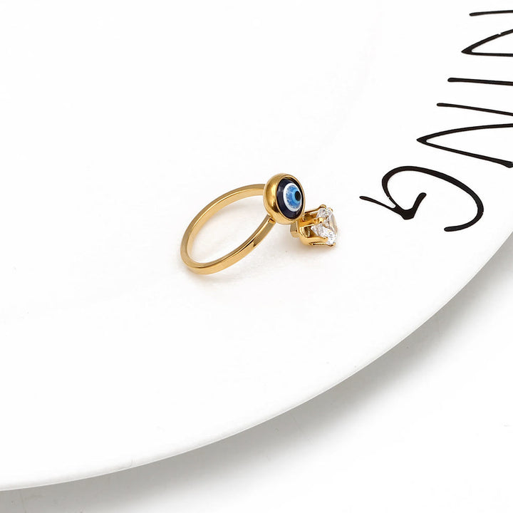 Anillo de mujer con ojo malvado bañado en oro y circonita blanca de Olivenorma 