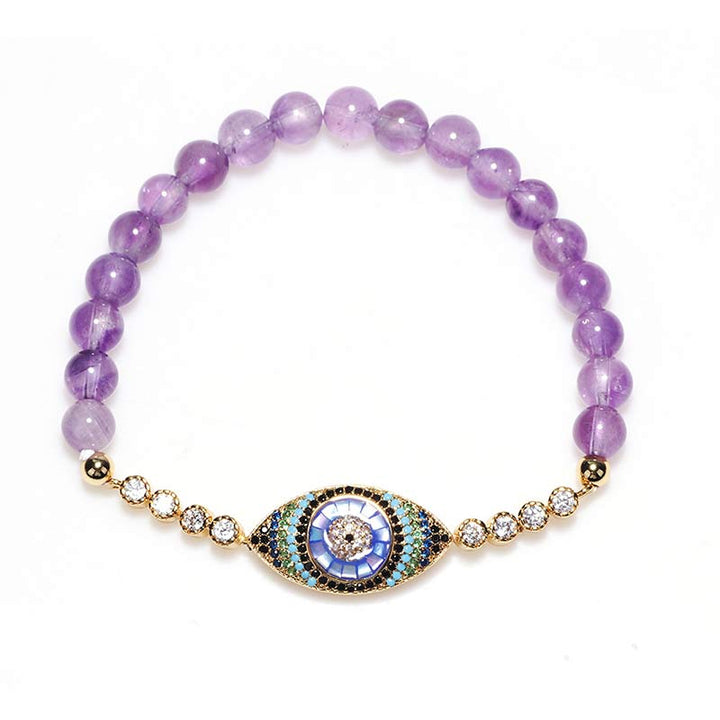 Pulsera curativa con símbolo del mal de ojo y amatista de Olivenorma 