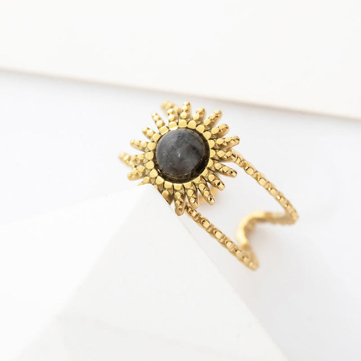 Anillo de gemas con estrella de ocho puntas y doble hilera de girasol de Olivenorma