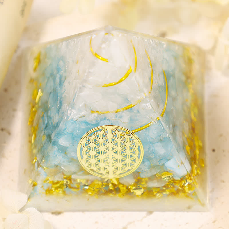 Pirámide de orgón con flor de la vida de piedra lunar de Olivenorma