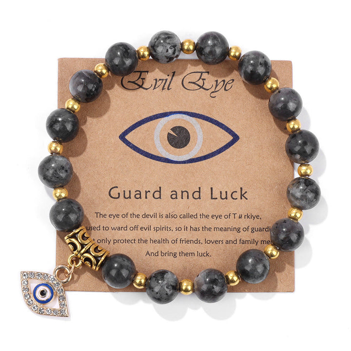 Pulsera con colgante de ojo malvado y cuentas de piedra natural de Olivenorma