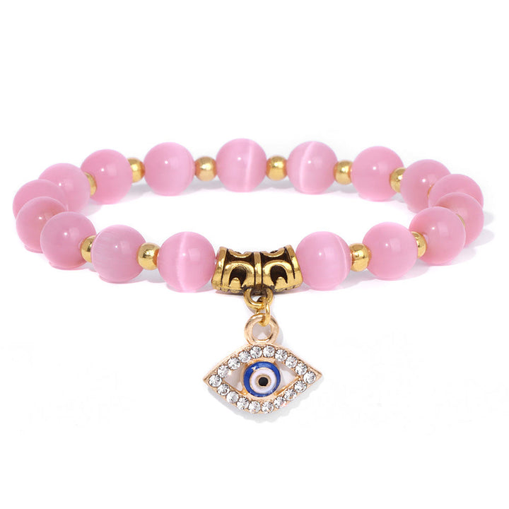 Pulsera con colgante de ojo malvado y cuentas de piedra natural de Olivenorma