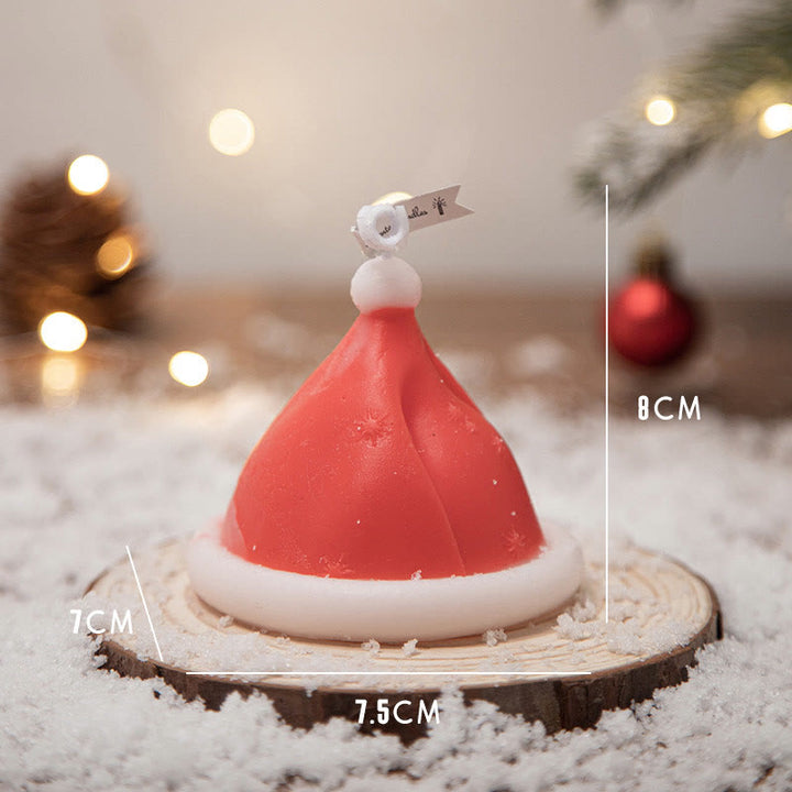 Vela perfumada con forma de hombrecito de jengibre y copos de nieve con atmósfera navideña de Olivenorma 
