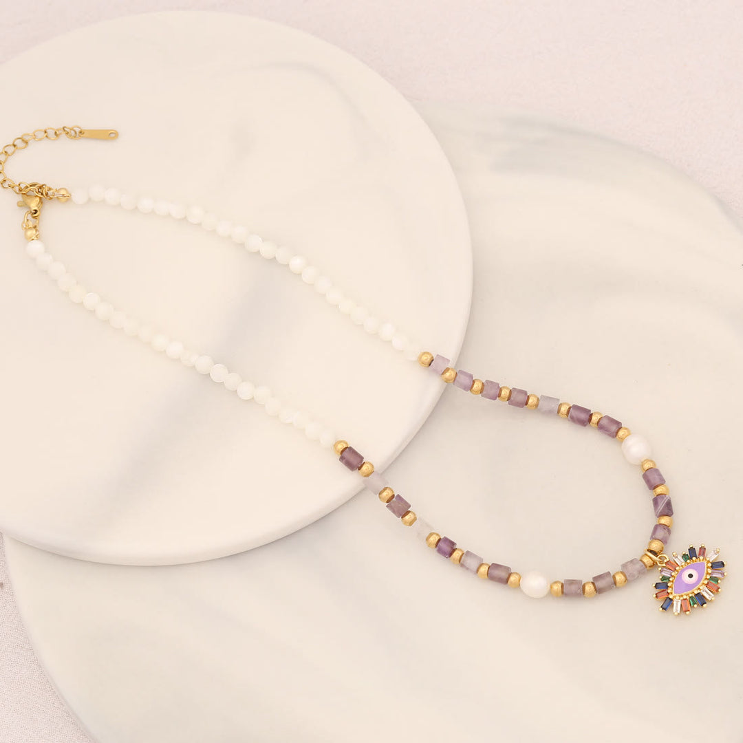 Collar con colgante de ojo malvado con piedra de cristal y perla natural de Olivenorma