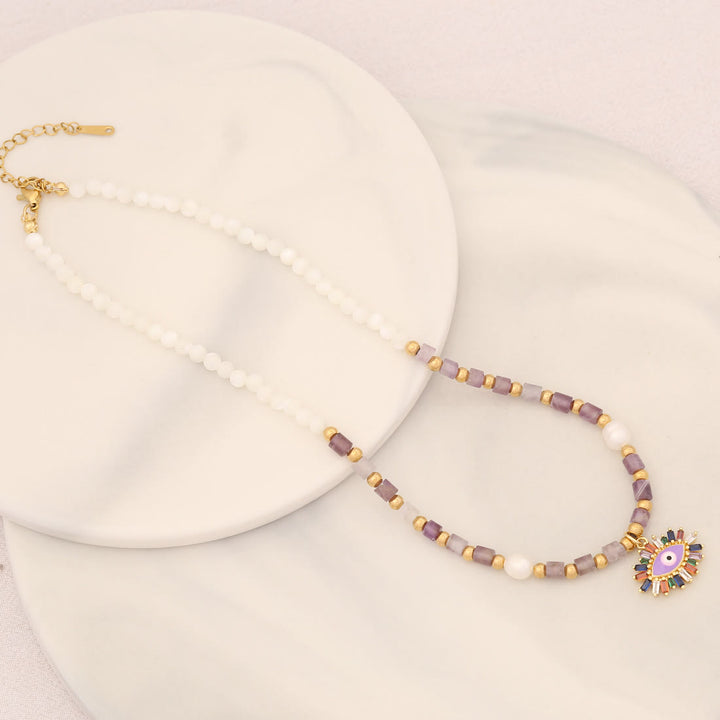 Collar con colgante de ojo malvado con piedra de cristal y perla natural de Olivenorma