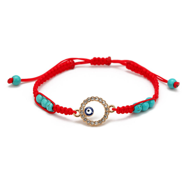 Pulsera trenzada ajustable con ojo malvado y circonita blanca y turquesa de Olivenorma 