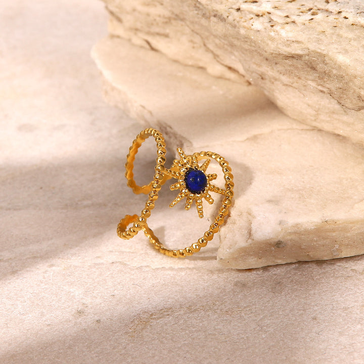 Anillo de gemas con estrella de ocho puntas y doble hilera de girasol de Olivenorma