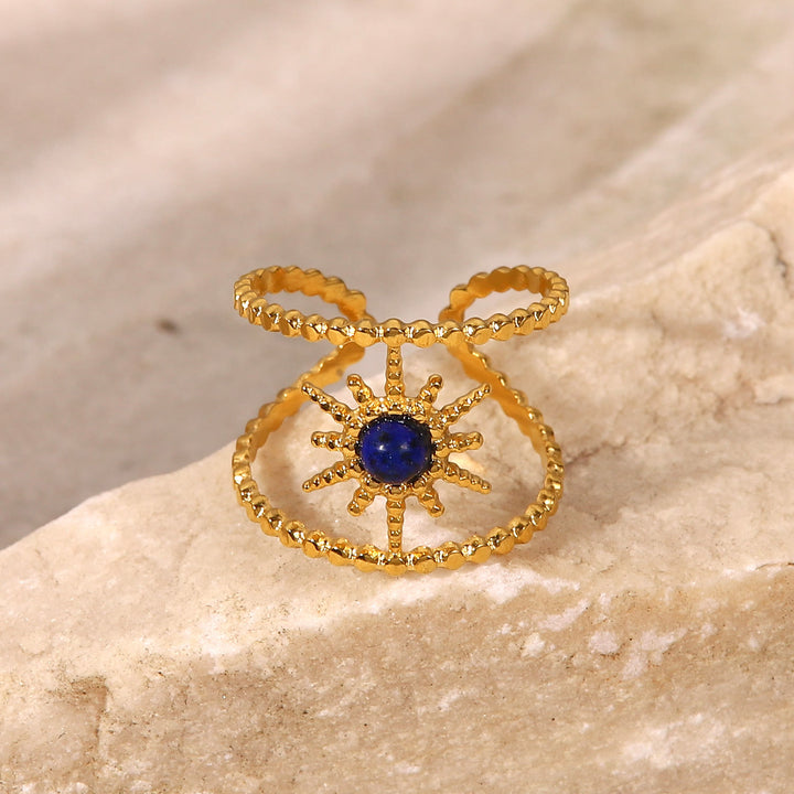 Anillo de gemas con estrella de ocho puntas y doble hilera de girasol de Olivenorma