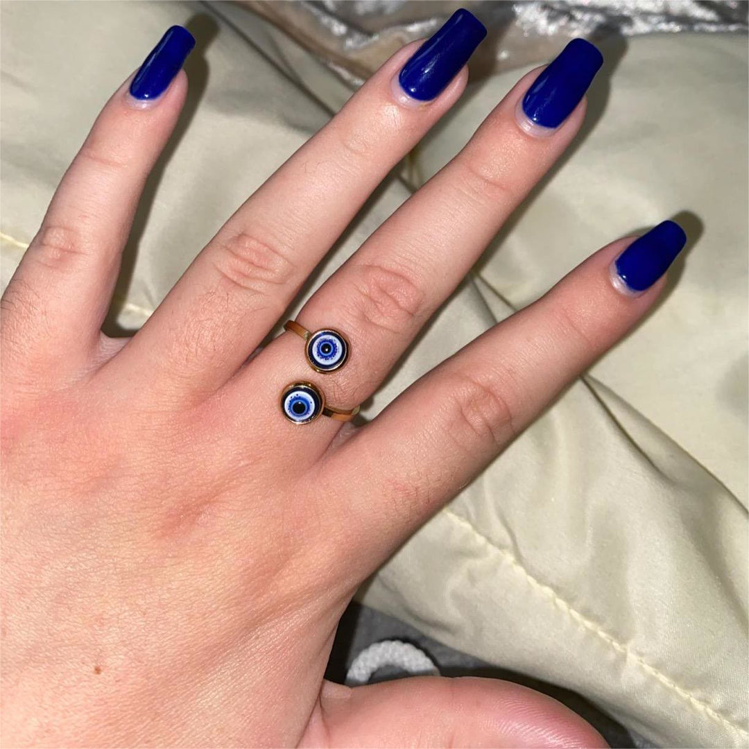 Anillo de mujer con ojo malvado bañado en oro y circonita blanca de Olivenorma 