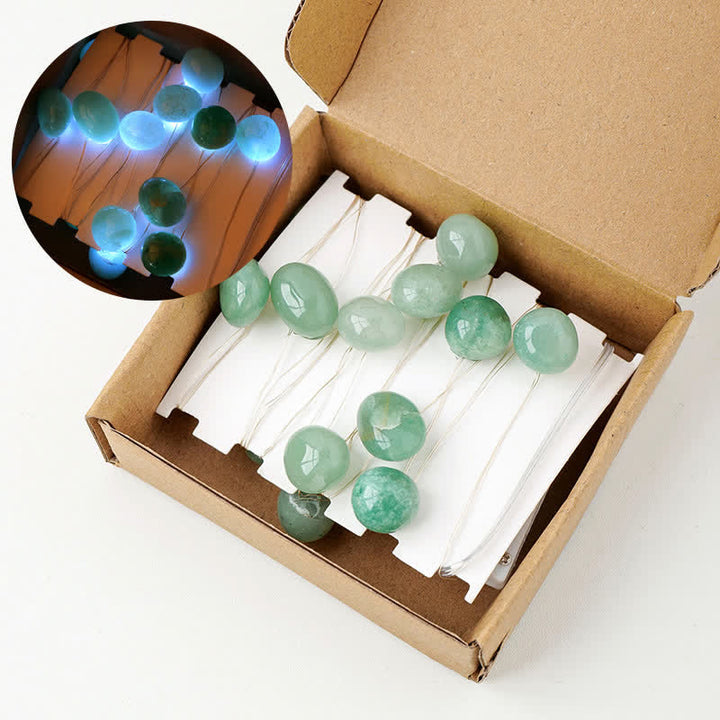Lámpara de piedras pulidas de cristal natural de Olivenorma para decoración de ambientes navideños