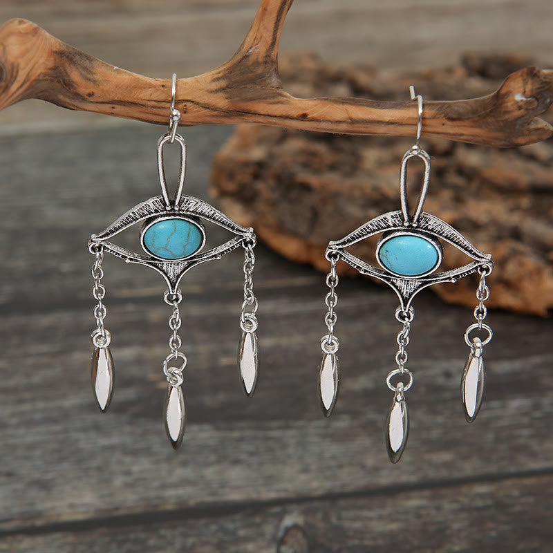 Pendientes bohemios con turquesa y ojo recortado geométrico de Olivenorma