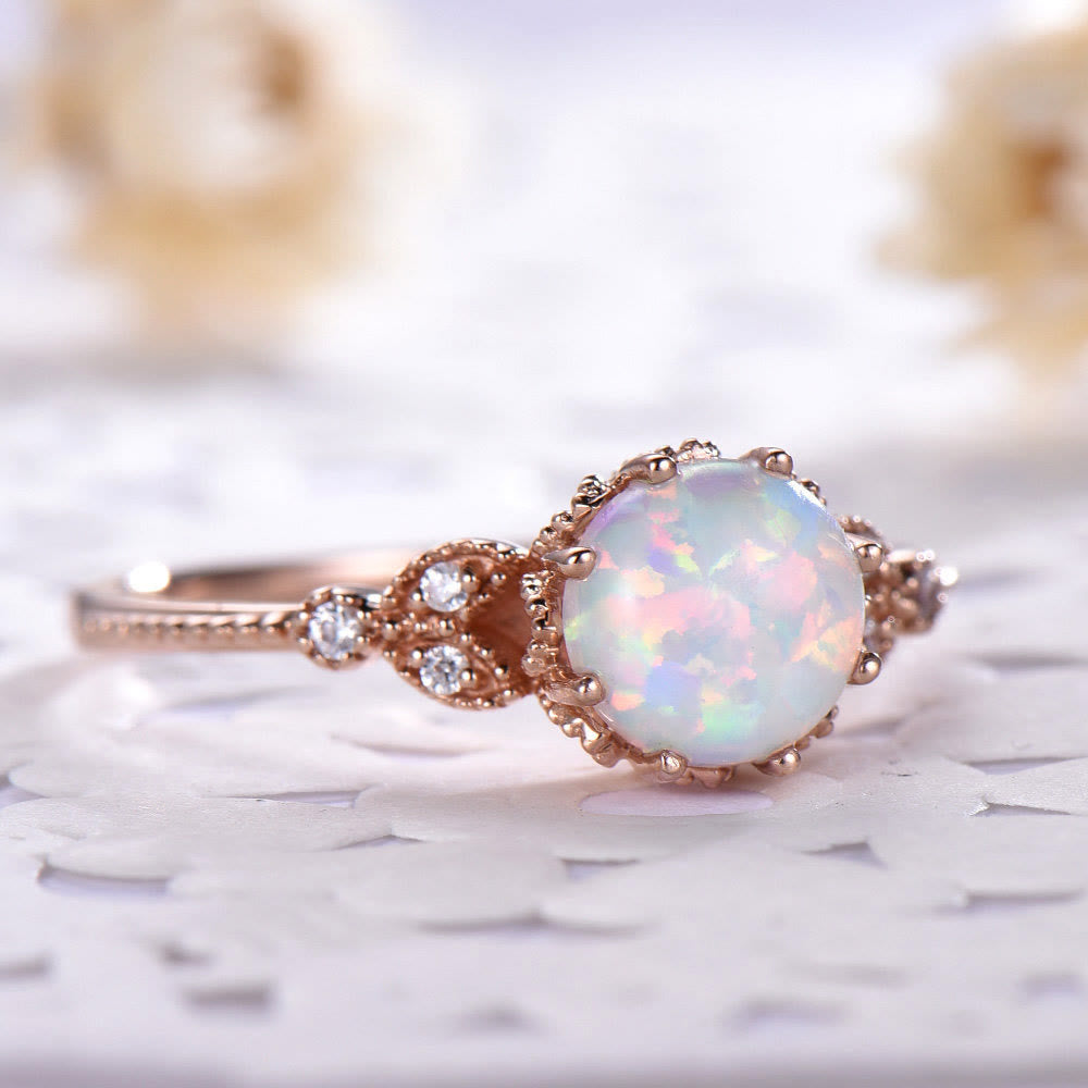 Anillo de piedra lunar redondo con ópalo y circonita blanca de Olivenorma 