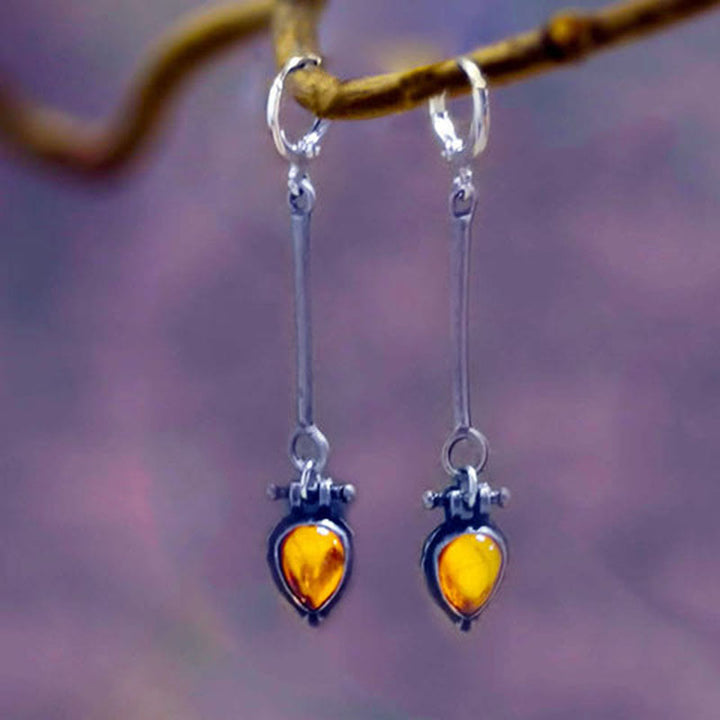 Pendientes de piedra de ámbar con forma de gota de agua de la tribu Olivenorma