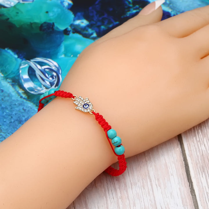 Pulsera trenzada ajustable con ojo malvado y circonita blanca y turquesa de Olivenorma 