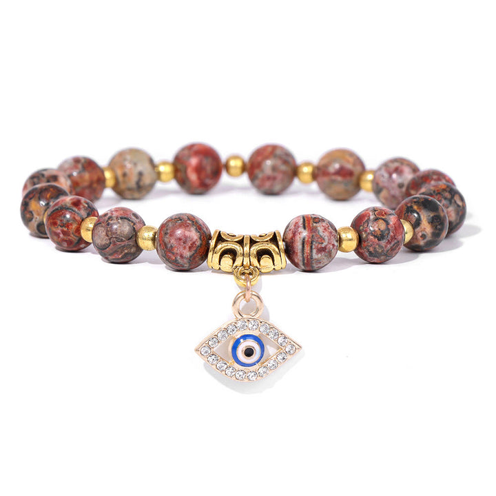 Pulsera con colgante de ojo malvado y cuentas de piedra natural de Olivenorma