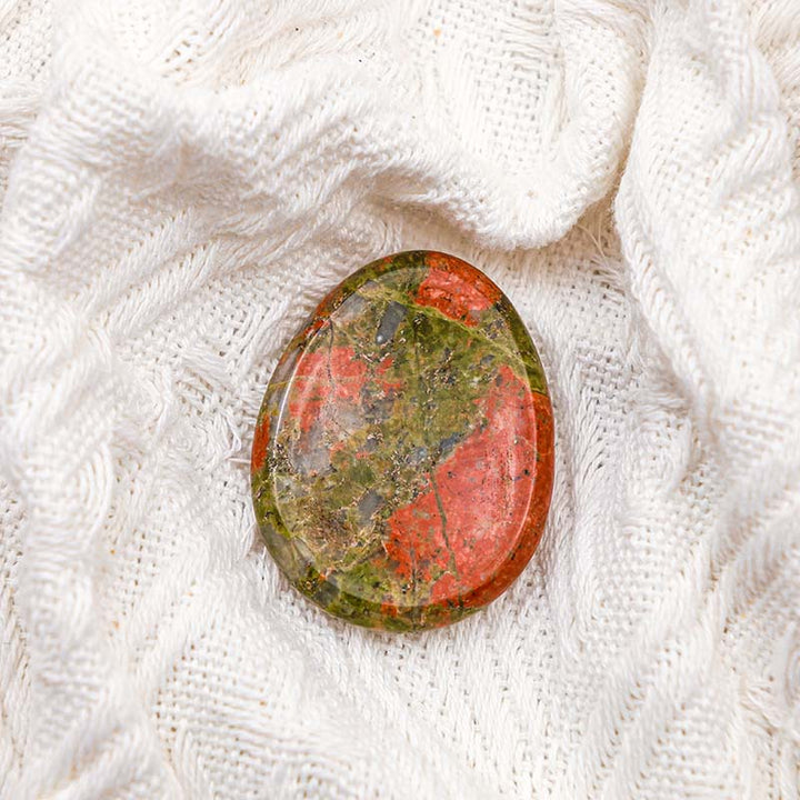 Piedra curativa para la preocupación del pulgar de unakita de Olivenorma