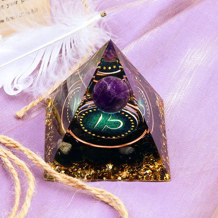 Pirámide de orgón del zodiaco Libra con esfera de amatista y obsidiana de Olivenorma 