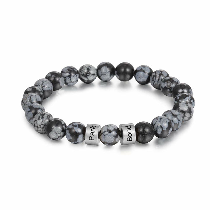 Pulsera de hombre personalizada con cuentas grabadas en piedra natural de Olivenorma