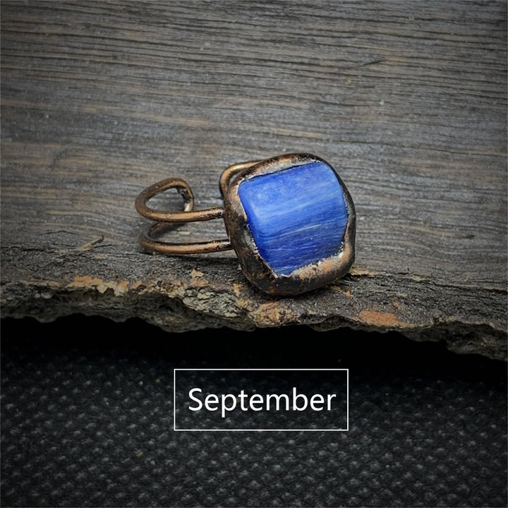 Anillo ajustable con doce piedras de nacimiento de piedra irregular natural en bruto de Olivenorma 