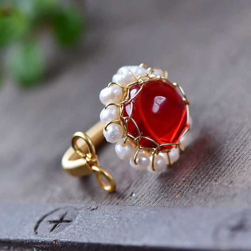 Anillo curativo de cuarzo rojo con perla
