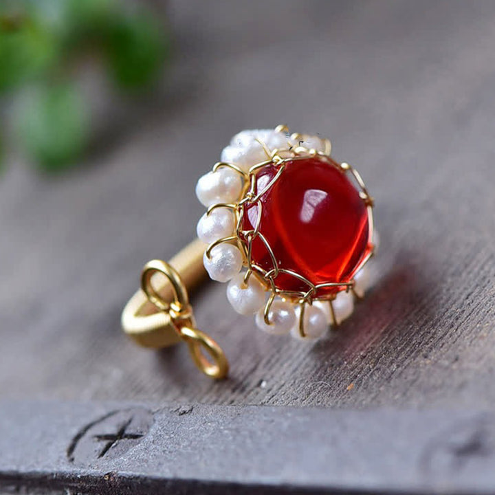Anillo curativo de cuarzo rojo con perla