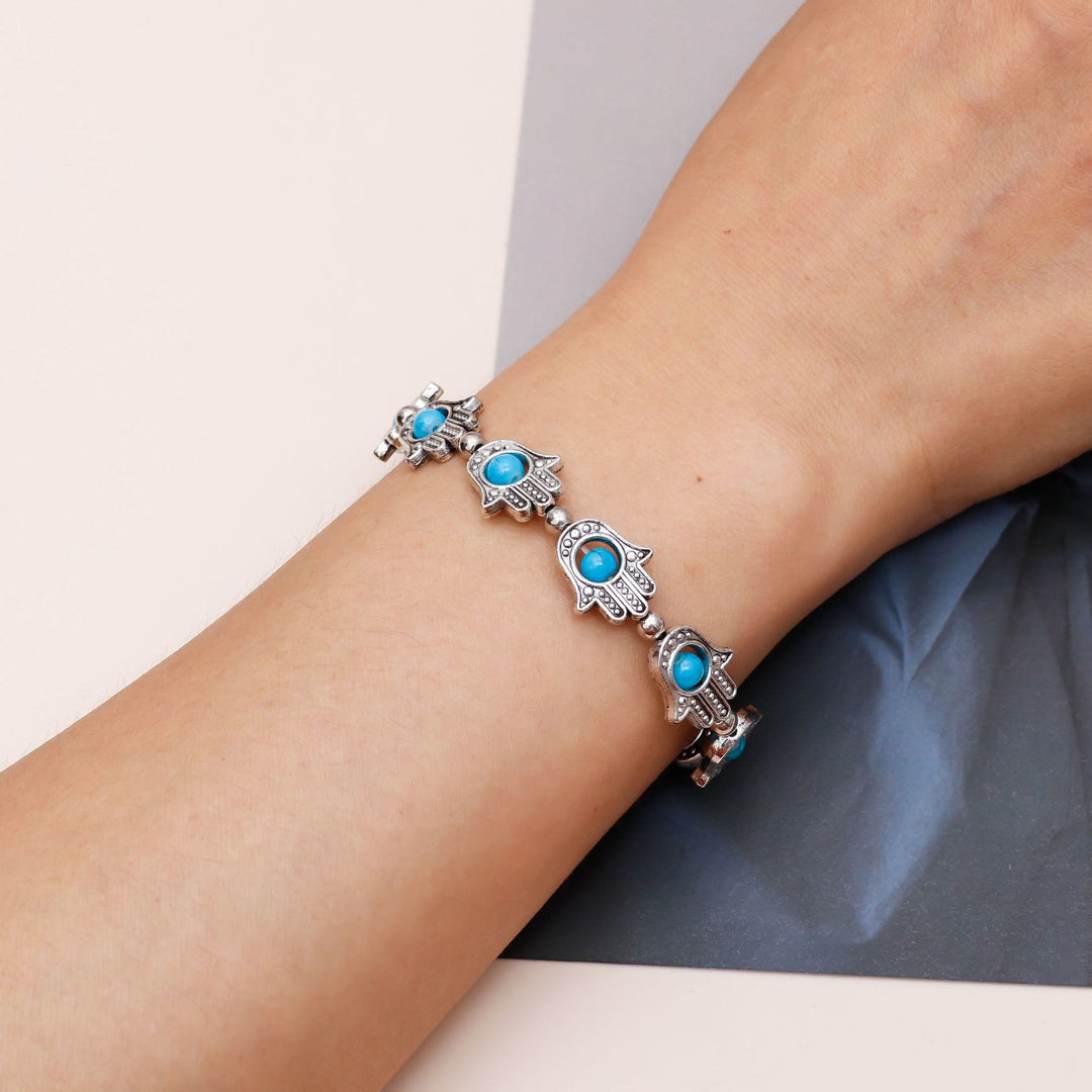 Pulsera Hamsa con ojo turco y turquesa natural de Olivenorma 