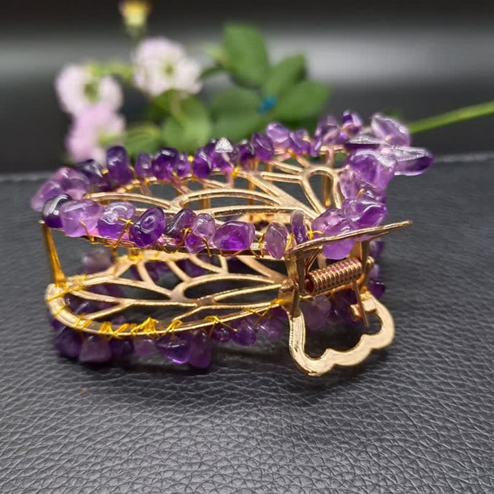 Horquilla con forma de mariposa de amatista o cuarzo rosa.