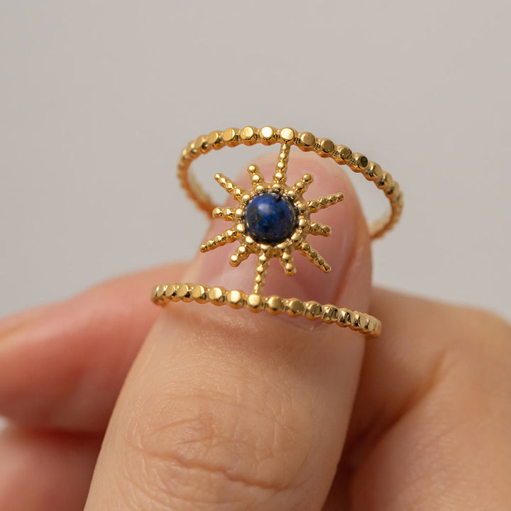 Anillo de gemas con estrella de ocho puntas y doble hilera de girasol de Olivenorma