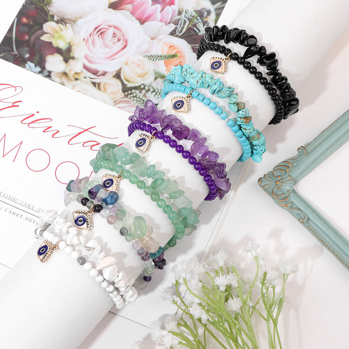 Juego de pulseras de cristal de doble capa con colgante de ojo malvado de Olivenorma