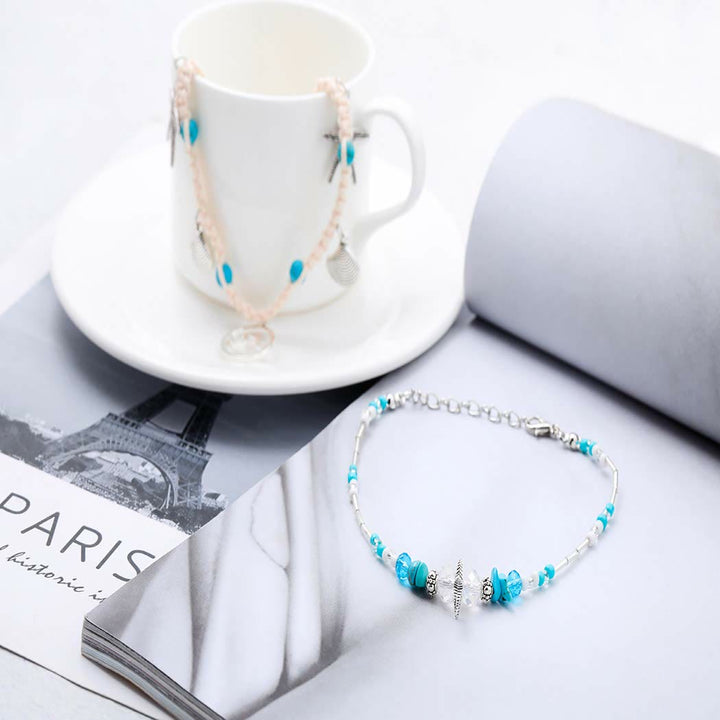 Pulsera tobillera con dije de estrella de mar turquesa y olas de Olivenorma