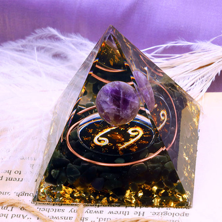 Pirámide de orgón del zodiaco Cáncer con esfera de amatista y obsidiana de Olivenorma 
