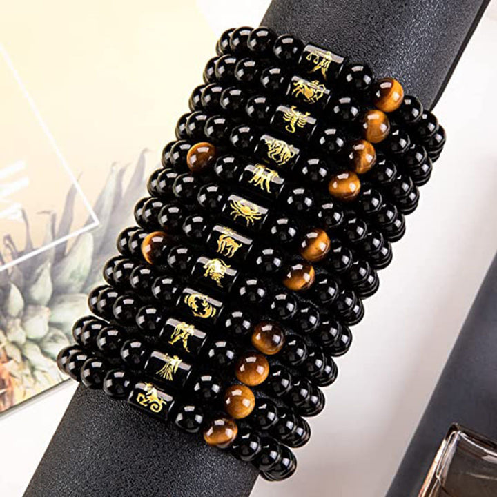 Pulsera del zodíaco de obsidiana y ojo de tigre de Olivenorma