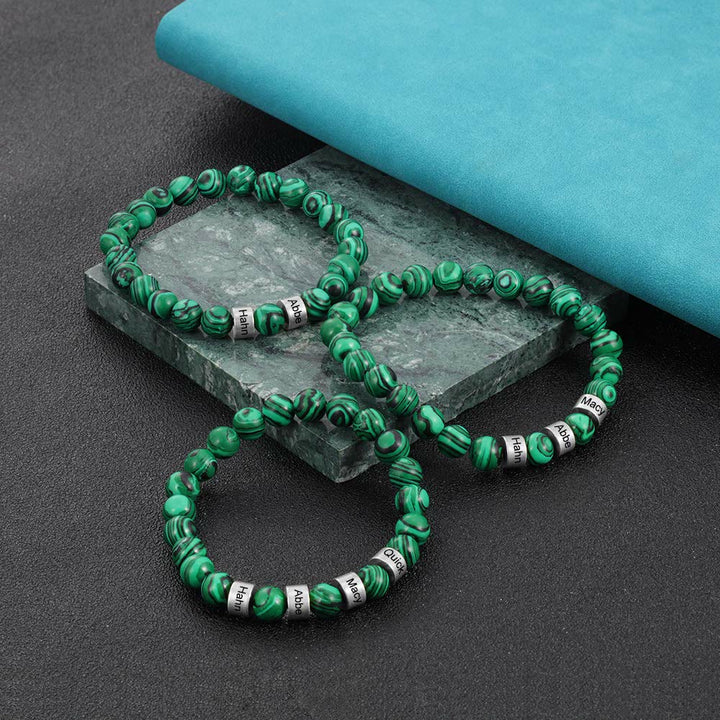 Pulsera de hombre personalizada con cuentas grabadas en piedra natural de Olivenorma