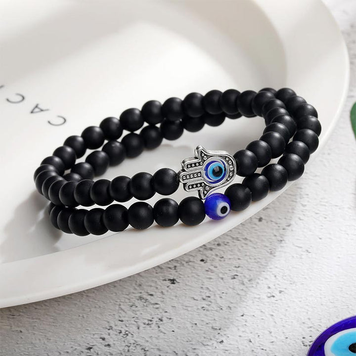 Pulsera de protección con ojo turco y hamsa de Olivenorma 
