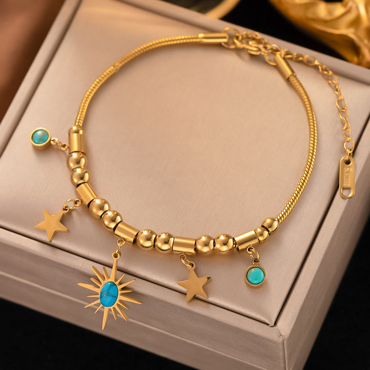 Pulsera envolvente con ojo malvado de turquesa dorada de Olivenorma