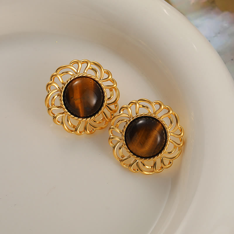 Pendientes de oro con girasol y ojo de tigre de Olivenorma