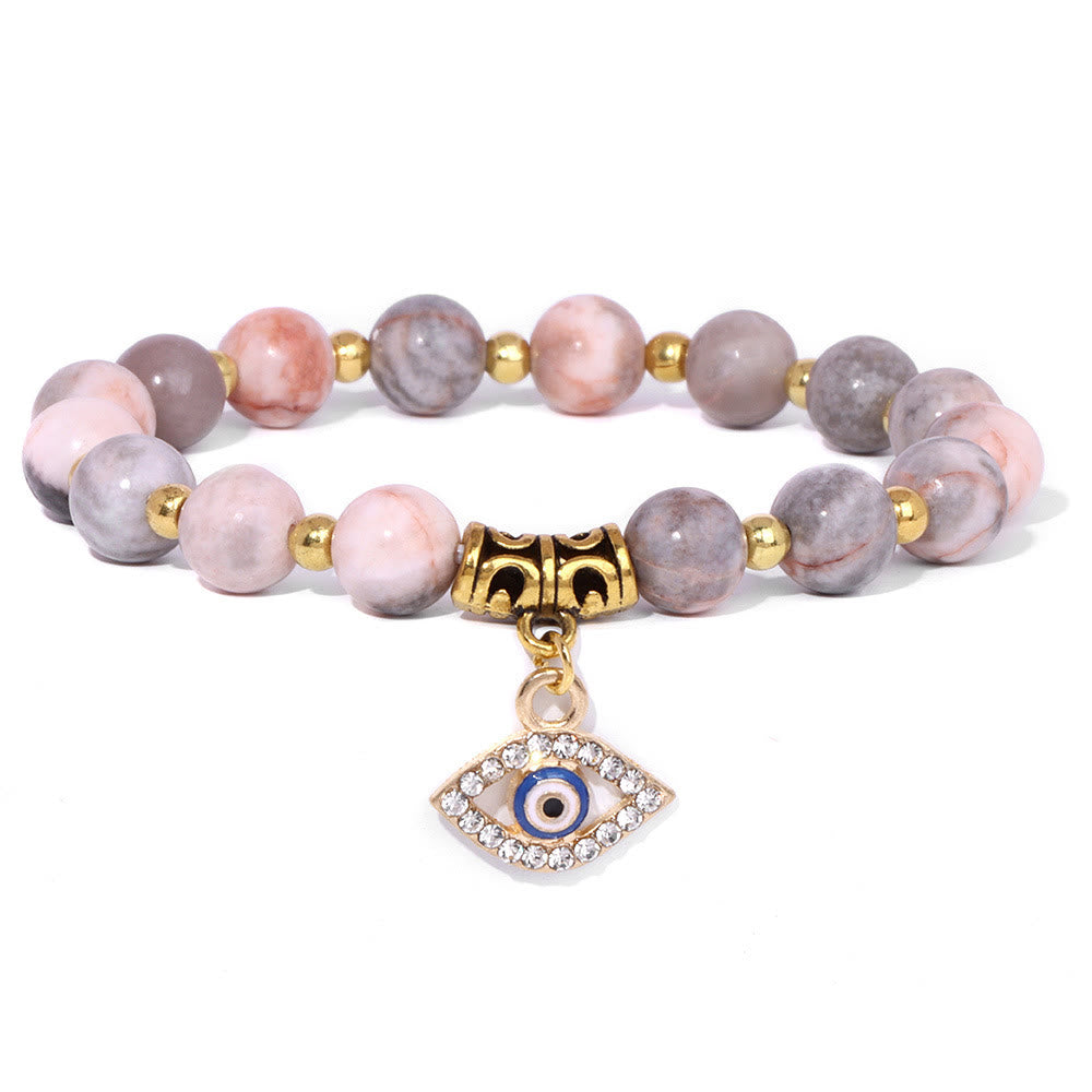 Pulsera con colgante de ojo malvado y cuentas de piedra natural de Olivenorma