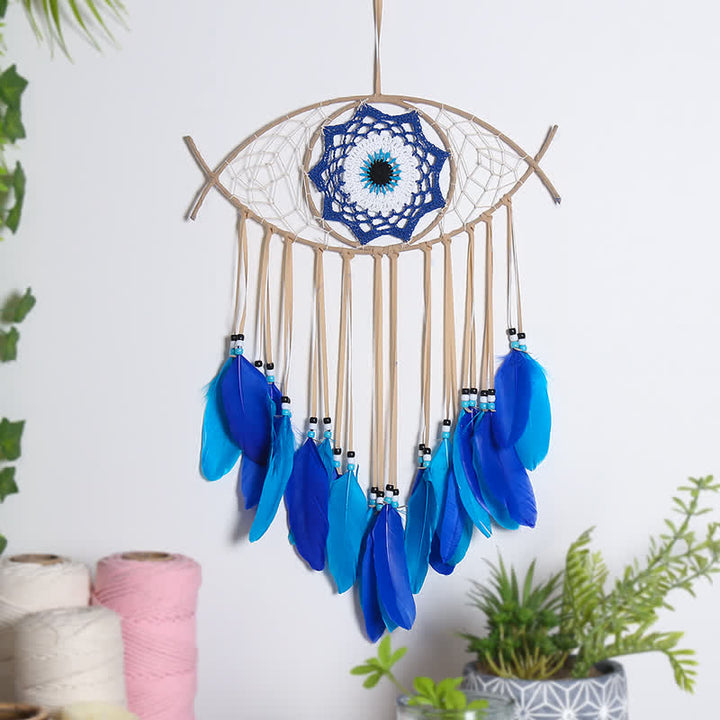 Atrapasueños de plumas de mal de ojo azul 